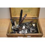 A Victorian parquetry inlaid table box containing various gentleman's wristwatches, including