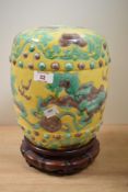 A 19th Century Chinese porcelain Sancai glazed vase, against a yellow ground and decorated with