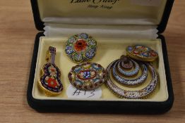 A small number of Italian micro mosaic enamelled brooches and pendant, to include a 1950s guitar