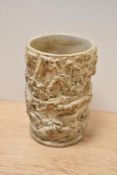 An continental stoneware tumbler, having hunting scene to outside, depicting boar, horse, huntsmen