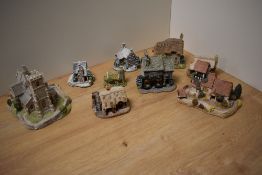 A group of nine Lilliput Lane model cottages, all pre 2000, to include St Marks, The Toy Shop,