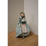 A Royal Doulton bone china figurine 'Suzette' HN1696, 19cm with green dress and peach tinted apron