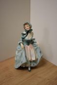 A Royal Doulton bone china figurine 'Suzette' HN1696, 19cm with green dress and peach tinted apron