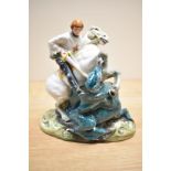 A Royal Doulton bone china figure group 'St George' HN2051, St George modelled slaying the dragon,