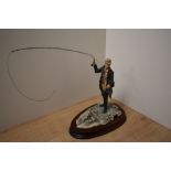 A Border Fine Arts figure 'Fly Fishing' model 110, c1988, on moulded mahogany plinth 20cm some