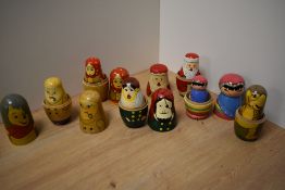 A group of six Russian hand-decorated Matryoshka dolls, of traditional form depicting Santa Claus,