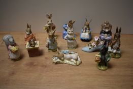 A collection of thirteen Royal Albert bone china Beatrix Potter figures, to include Old Woman in a