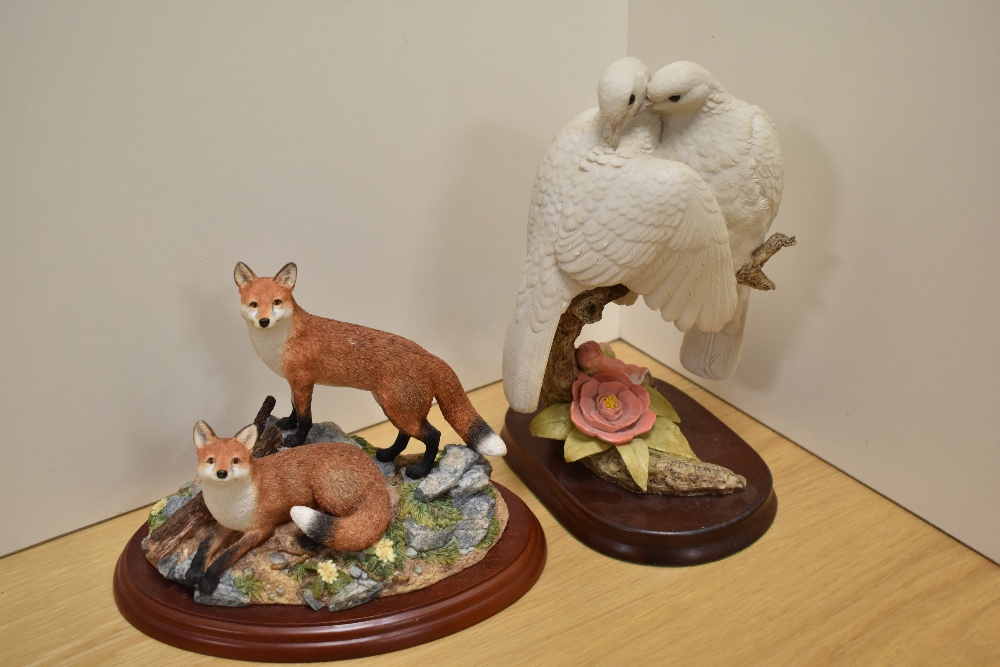 A Border Fine Arts animal group 'Fox-trot' A1019, modelled as two young foxes in a naturalistic