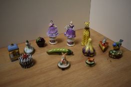 A collection of eleven Limoges hand-painted porcelain trinket boxes, formed as fruit, animals and