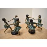 A pair of Maitland-Smith cast, painted and patinated brass sculptures, formed as a linked group of