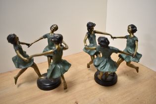 A pair of Maitland-Smith cast, painted and patinated brass sculptures, formed as a linked group of
