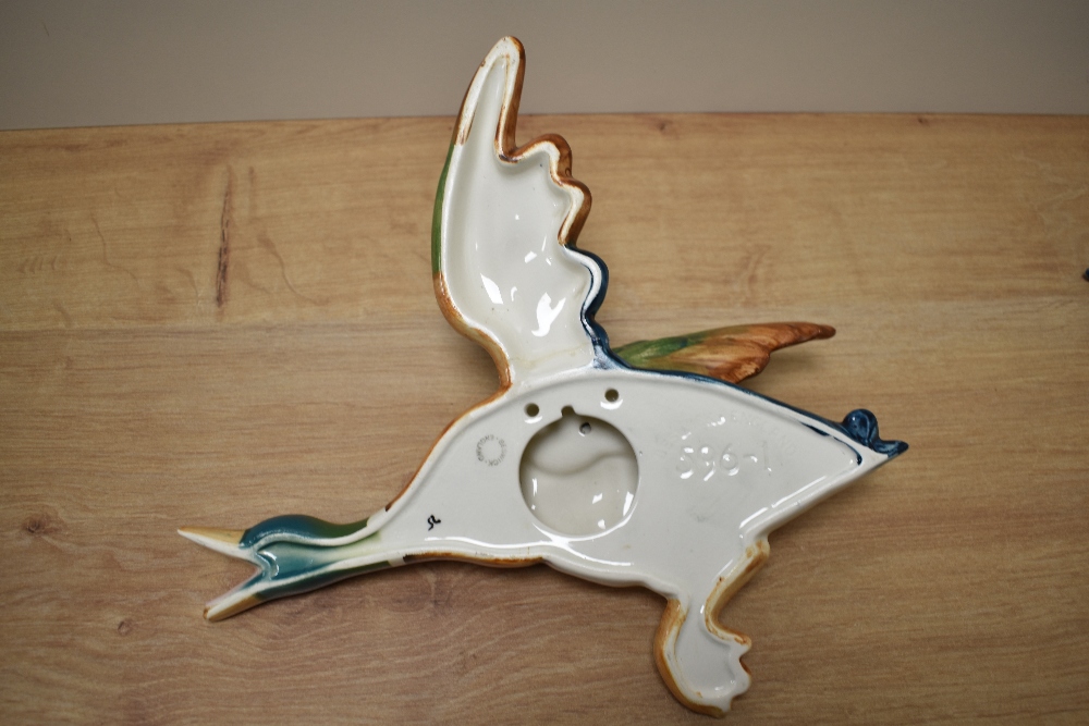 A group of four graduating Beswick Pottery flying mallard wall plaques, 596-1 (repair to wing) 596- - Image 2 of 5