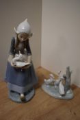 A Lladro porcelain figurine, a young Dutch girl with duck or goose, printed marks to underside 26cm,