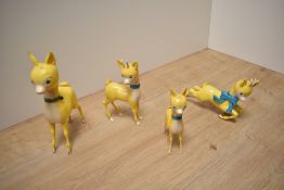 A group of four 1950's/60's cast-plastic Babysham advertising deer figures,