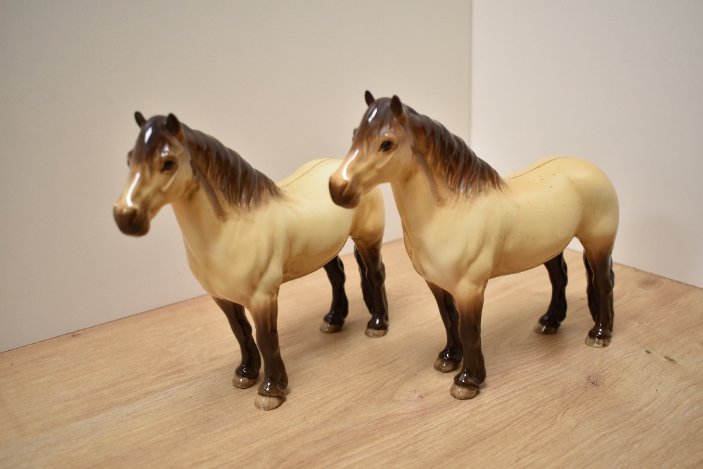 Two Beswick Pottery Highland Pony studies, number 1644 designed by Arthur Gredington in dun gloss,