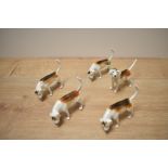 A group of five Beswick Pottery Foxhounds model numbers 2264 (4) second version designed by Graham