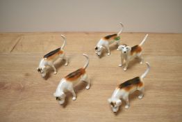 A group of five Beswick Pottery Foxhounds model numbers 2264 (4) second version designed by Graham