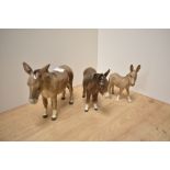 A group of three Beswick Pottery Donkey studies, comprising 'Donkey' 2267A designed by Albert Hallam