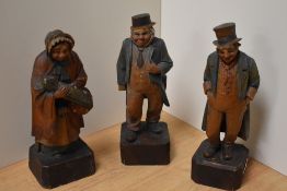 A group of three carved and hand-decorated pine Dickens figures, Mrs Gamp, Captain Cuttle and Artful