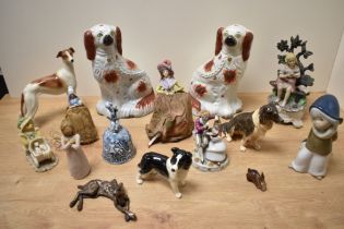 A selection of various figurines and animal studies, to include a pair of Staffordshire Pottery