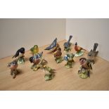 A group of twelve Beswick Pottery bird studies, comprising Stonechat 2274, Grey Wagtail 1041,