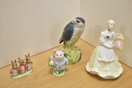 A Royal Worcester bone china figurine 'Spring Fair', sold together with a Royal Doulton Whyxte &