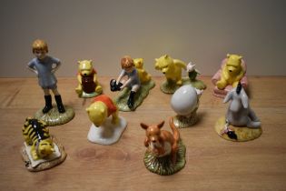 A collection of ten Royal Doulton 'The Winnie-The-Pooh Collection' figures, comprising Christopher