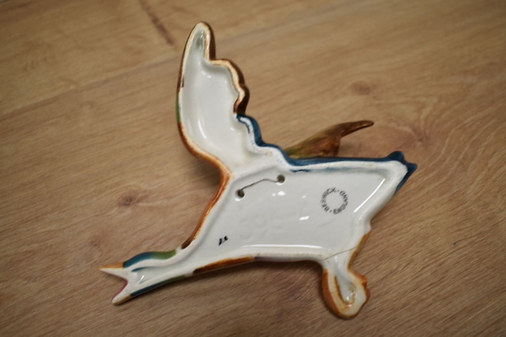 A group of four graduating Beswick Pottery flying mallard wall plaques, 596-1 (repair to wing) 596- - Image 4 of 5