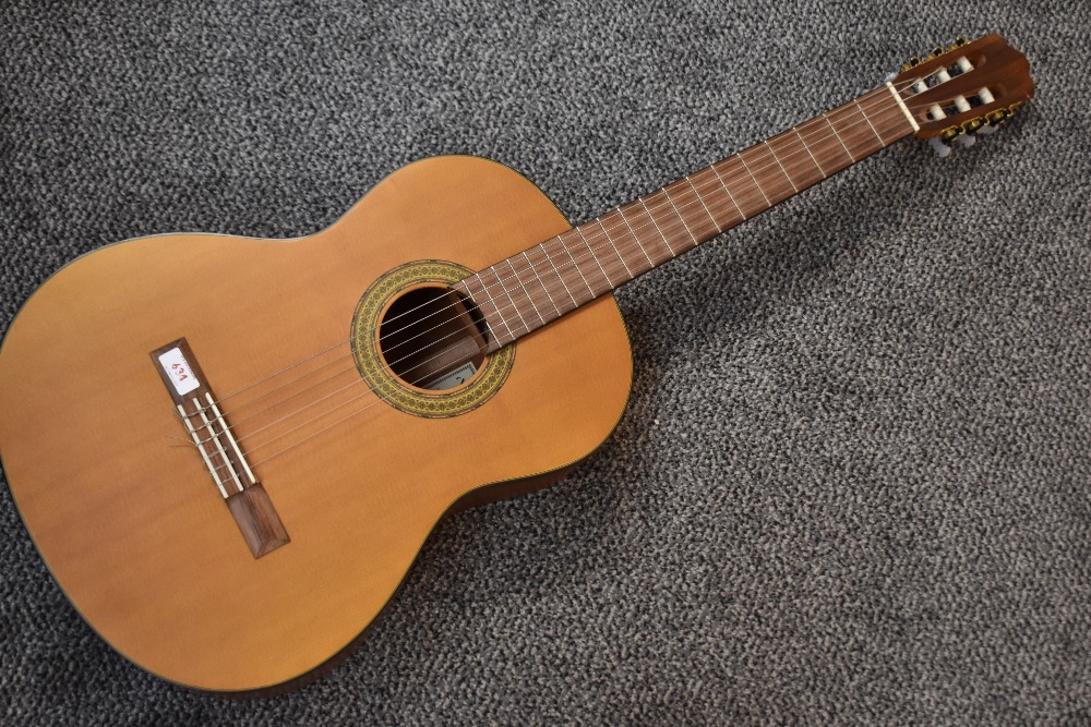 A modern classical guitar, labelled Walden, model N550, spruce and cedar, serial number 0701640