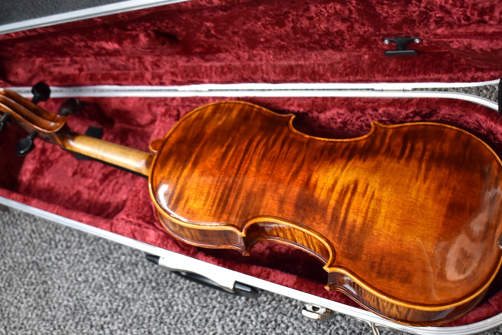 A modern violin having 4inch one piece back , unlabelled, with Hiscox fitted case - Image 2 of 4