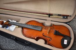 A modern violin, labelled Max Bruch Stradivarius copy, with case and bow