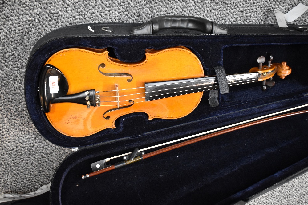 A modern violin having two piece 13inch back , with bow and case