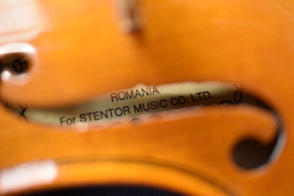 A modern half size violin labelled Stentor , made in Romania, with bow and croc effect case - Image 2 of 3