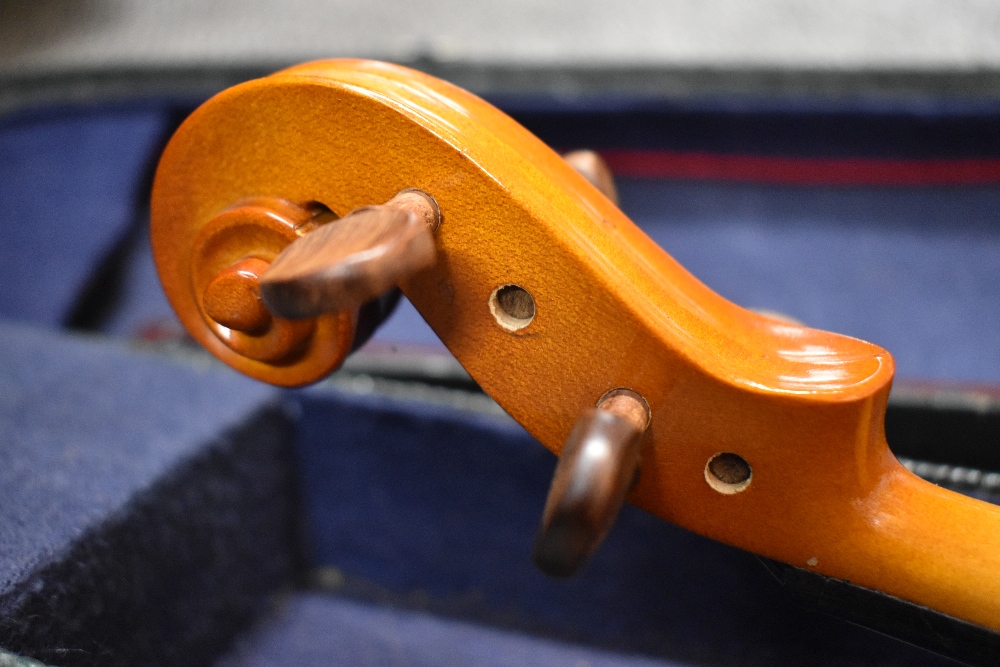 A modern half size violin labelled Stentor , made in Romania, with bow and croc effect case - Image 3 of 3