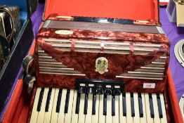 A vintage Bell accordion, with hard case