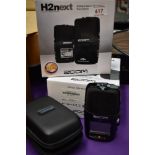 A Zoom H2next portable SD recorder and accesories