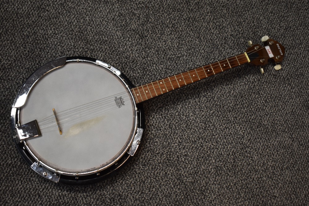 A vintage 'Boston' four string banjo