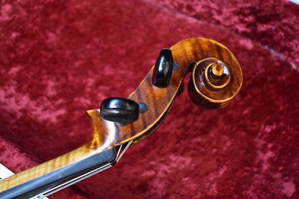 A modern violin having 4inch one piece back , unlabelled, with Hiscox fitted case - Image 4 of 4