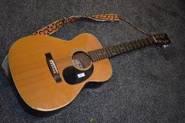 A vintage Fender F-25 acoustic guitar