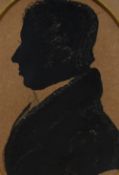 19th Century School, a silhouette portrait miniature, oval framed, mounted, and under glass,