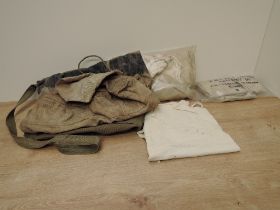 A collection of WWII ARP Indoor Sand Bags for combating Incendiary Bombs along with a Military Kit