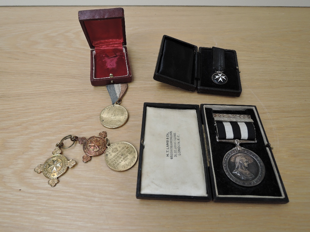 Two St Johns Medals to 31949 A/SIS R.THOMAS.LANCASHIRE S.J.A.B 1945, Service Medal of the Order of
