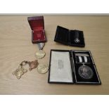 Two St Johns Medals to 31949 A/SIS R.THOMAS.LANCASHIRE S.J.A.B 1945, Service Medal of the Order of