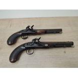 A pair of Flintlock Pistols, possibly duelling pistols, both by W Smart, identical proof marks to