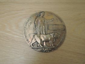 A WWI Bronze Death Plaque named to John Henderson