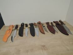 Six modern Bowie Knives all with leather scabbards including German, Pakistan, Japanese, Herbert