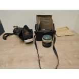 Two WWII Gas Masks, one boxed, one in bag along with spare cylinder and a Anti Gas MKII Eye Shield