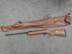 A BSA Meteor .22 Air Rifle, missing rear sights in leather gun case
