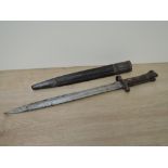 A British Lee Enfield Bayonet MKI with double edged blade, blade marked VR 9 92 Wilkinson, on