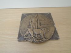 A WWI Bronze Death Plaque named to William Roberts with letter from Buckingham House signed George